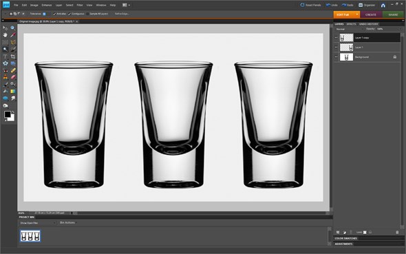 9. Select the top layer, choose Magic Wand tool (press W) and change Tolerance to 10.